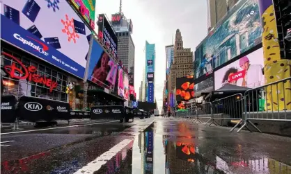  ?? Photograph: Kena Betancur/AFP/Getty Images ?? In New York ‘time has slowed to a crawl. Nothing is happening’.