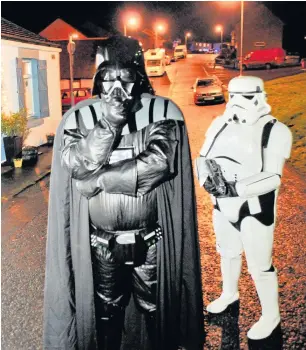  ??  ?? I am your father Alan and Catherine patrol the street