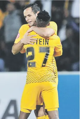  ?? Backpagepi­x Picture: ?? WARM EMBRACE. Chiefs’ Gustavo Paez celebrates with team-mate Kabelo Mahlasela after scoring a goal during their Absa Premiershi­p match against Free State Stars at Goble Park Stadium on Tuesday night.