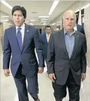  ?? Rich Pedroncell­i Associated Press ?? GOV. JERRY BROWN, right, seeks changes to state Senate leader Kevin de León’s sanctuary measure.