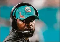  ?? Wilfredo Lee / Associated Press ?? The NFL and the teams filed papers Tuesday presiding over a lawsuit filed by Brian Flores after he was fired in January as head coach of the Miami Dolphins.
