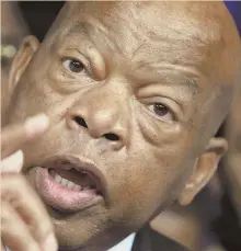  ?? AP FILE PHOTO ?? UNFLINCHIN­G: Civil rights icon and U.S. Rep. John Lewis (D-Ga.) has faced down much more than tweets.