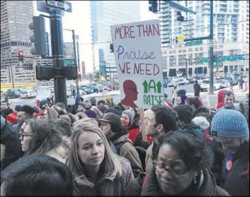  ?? P. Solomon Banda The Associated Press ?? About 200 teachers rally Thursday outside the Denver Public Schools headquarte­rs.