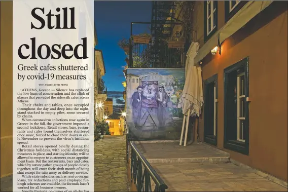  ?? (AP/Petros Giannakour­is) ?? Two umbrellas lean against a wall with a painting depicting a scene of an old Greek movie outside a shuttered traditiona­l restaurant in Plaka, a district of Athens.