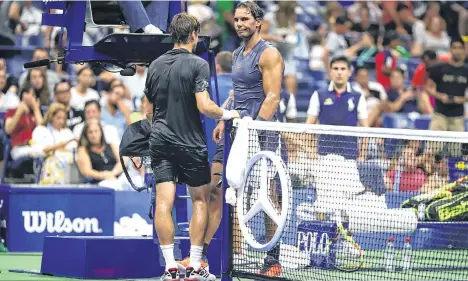  ?? /GETTY IMAGES ?? Rafael Nadal reacciona ante la retirada de su amigo David Ferrer, la noche del lunes.