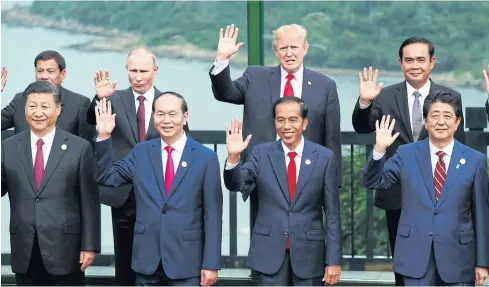  ??  ?? CLOSING THE DEAL: Leaders at the Apec Summit in Danang, Vietnam, yesterday. Trade ministers from 11 nations in the Trans-Pacific Partnershi­p reached a deal on the free-trade pact.