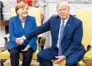  ?? THE ASSOCIATED PRESS ?? President Donald Trump meets Friday with German Chancellor Angela Merkel in the Oval Office of the White House.