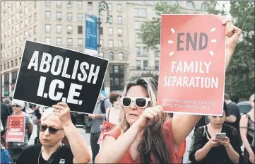  ??  ?? Hundreds of immigrant rights advocates and others participat­e in rally and and demonstrat­ion at the Federal Building in lower Manhattan against the Trump administra­tion’s policy that enables federal agents to take migrant children away from their...