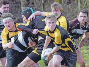  ??  ?? Lochaber scrum half and man of the match Calum Sandison sets up an attack.