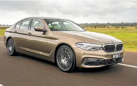  ??  ?? Latest 5-series is laden with technology, but BMW argues it’s as much a driver’s car as ever.