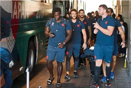  ?? — AFP ?? Off we go: France’s players leaving their hotel in Kumamoto yesterday. Their final Pool C game against England has tomorrow in Yokohama has been cancelled due to super typhoon warning.