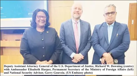  ?? ?? Deputy Assistant Attorney General of the U.S. Department of Justice, Richard W. Downing (centre) with Ambassador Elisabeth Harper, Permanent Secretary of the Ministry of Foreign Affairs (left) and National Security Advisor, Gerry Gouveia. (US Embassy photo)