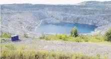  ??  ?? The open pit of the now-closed Jeffrey mine in Asbestos, Que.