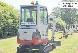  ??  ?? The digger used on the grave