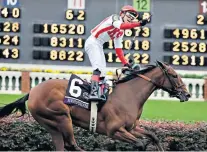  ??  ?? Big win: Irad Ortiz Jr celebrates on Newspapero­frecord