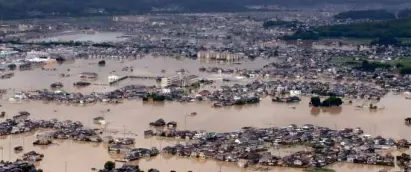  ?? AFP ?? WATERWORLD Aerial photo shows the extent of flooding in one of three severely affected prefecture­s in Japan.—