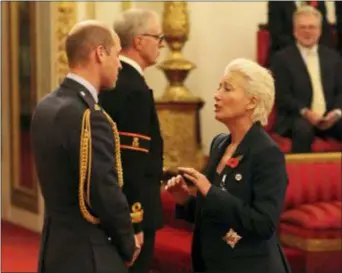  ?? JONATHAN BRADY — PA VIA AP ?? Emma Thompson is made a Dame Commander of the British Empire by Prince William at Buckingham Palace, London, Wednesday.