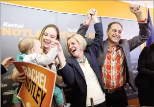  ?? CP FILE PHOTO ?? NDP Leader Rachel Notley, Calgary East candidate Robyn Luff and her daughter Vesper, and Calgary-Fort NDP candidate Joe Ceci attend a campaign event at Ceci’s campaign headquarte­rs in Calgary in 2015. Luff says she won’t take her seat in the legislatur­e to draw attention to what she calls a “toxic culture” in the governing caucus.