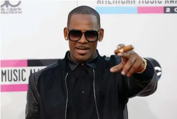  ??  ?? R. Kelly arrives at the 41st American Music Awards in Los Angeles, California, Nov 24, 2013. — Reuters file photo