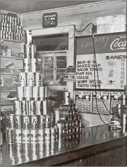  ?? Contribute­d ?? The lunch counter in the original Troy’s location. It looks like the highest price on the menu board was $0.15.