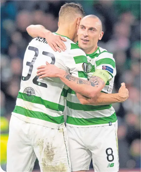  ??  ?? Scott Brown and Filip Benkovic celebrate Celtic’s Europa League progress after Thursday’s meeting with Salzburg