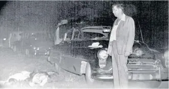  ?? FLORIDA STATE ARCHIVES ?? Bottom: Shepherd, left, and Irvin lie on the roadside near Umatilla after they were shot by Lake County Sheriff Willis McCall. He claimed the handcuffed men tried to escape as he transferre­d them from prison to a jail. Shepherd was killed and Irvin critically wounded.