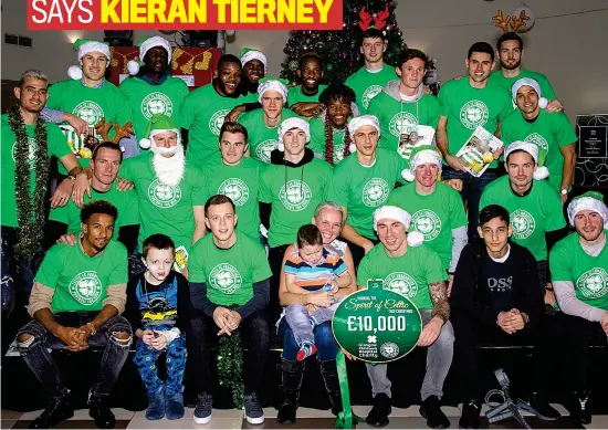  ??  ?? Creating some Christmas cheer: the Celtic squad deliver a special donation of £10,000 to Glasgow’s Children’s Hospital yesterday