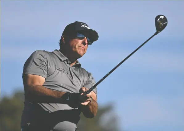  ?? — AP FILE PHOTO ?? Phil Mickelson hasn't played since a tournament in Saudi Arabia in February. The six-time major champion is the subject of an unauthoriz­ed biography detailing his huge gambling debts and has thrown in financiall­y with Saudi Arabia Crown Prince Mohammed bin Salman.