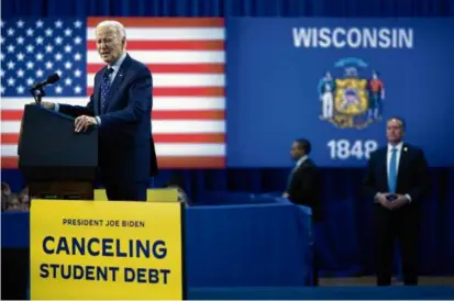  ?? TOM BRENNER/NYT ?? President Biden spoke about his student loan debt relief plan on Monday in Madison, Wis.