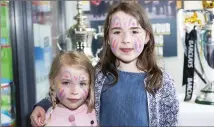  ??  ?? Laurn and Molly Kerins-Chapman get their faces painted at the opening of the revamped Centra store in Caltragh last Saturday