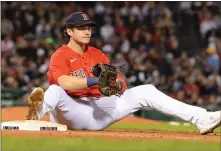  ?? JIM MAHONEY / BOSTON HERALD ?? IN TROUBLE: Red Sox first baseman Bobby Dalbec sits on the ground after not coming up with a double play ball in the seventh inning against the White Sox on Friday.