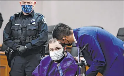  ?? Helen H. Richardson The Associated Press ?? Supermarke­t shooting suspect Ahmad Al Aliwi Alissa appears before District Court Judge Thomas Mulvahill on Thursday.