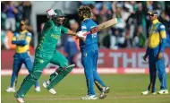  ?? – Reuters ?? CAPTAIN’S KNOCK: Pakistan’s captain Sarfraz Ahmed celebrates after leading his team to victory over Sri Lanka in the Champions Trophy at Sophia Gardens in Cardiff on Monday.