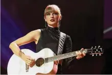  ?? Terry Wyatt/getty Images ?? Taylor Swift’s “Midnights” offers slick, beat-heavy arrangemen­ts and allusions to the singer’s feuds and affairs.