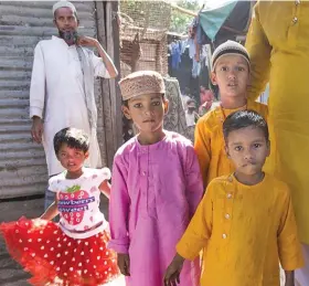  ??  ?? Children celebrate Eid al-Fitr outside their home during lockdown to curb the spread of COVID-19, in New Delhi, India, on May 25, 2020.