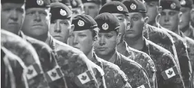  ?? JEFF MCINTOSH / THE CANADIAN PRESS ?? The ranks of the Canadian Forces are set to expand by 3,500 soldiers, although an auditor’s report released Thursday casts doubt on its ability to recruit those numbers.