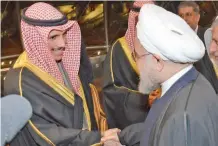  ??  ?? National Assembly Speaker Marzouq Al-Ghanem welcomes Iranian President Hassan Rouhani.