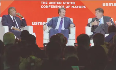  ?? STAFF FILE PHOTOS BY CHRIS CHRISTO ?? PRICEY AFFAIR: Above from left, Columbia, S.C., Mayor Steve Benjamin, Bank of America CEO Brian Moynihan and Boston Mayor Martin J. Walsh at this month’s U.S. Conference of Mayors in Boston. Top, Moynihan and Walsh.