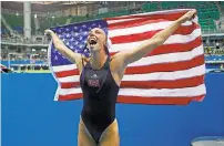  ?? EDUARDO VERDUGO/THE ASSOCIATED PRESS ?? KK Clark celebrates after the U.S. took its second straight water polo gold medal.