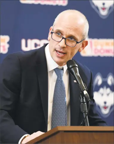  ?? Stephen Dunn / Associated Press ?? Dan Hurley speaks after being introduced as the new men’s basketball coach at UConn on Friday in Storrs. Hurley, who coached Rhode Island into the NCAA Tournament the past two seasons, replaces Kevin Ollie, who was fired earlier this month.