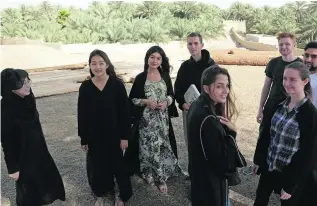  ?? Jeffrey E Biteng / The National ?? From left: Afghan Abda Kazemi, Taiwanese Alice Huang, Tajik Gulnoza Mansur, Swede Alexander Burlin, Moldovan Cristina Lupusor, New Zealander Thomas Yates, Alexandra Padowska from Poland and Firas Ashraf from the UK take a break from class.