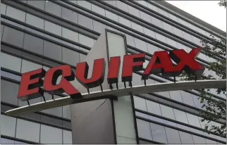  ?? MIKE STEWART — THE ASSOCIATED PRESS ?? A class action lawsuit contends faulty credit data calculated by Equifax led to the denial of a less expensive car loan for a Florida woman because of a 130-point mistake she says was due to a coding error.