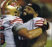  ?? NHAT V. MEYER — STAFF PHOTOGRAPH­ER ?? The 49ers’ Trent Williams, right, celebratin­g with George Kittle, may be in line for the richest deal ever for a tackle.