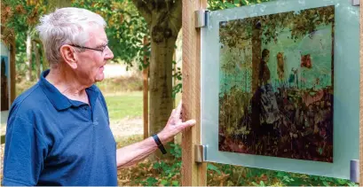  ?? ?? ► Patchings Art Club member, David Kimmins, with his copy of Noon by George Henry