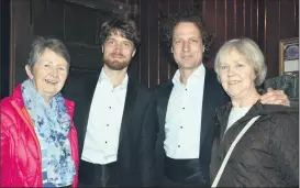  ?? Ahern) (Pic: John ?? BROTHERS & SISTERS: Castletown­roche sisters, Anne Cox and Eileen Joyce, in the company of Slovakian violinists, brothers Vladimir and Anton Jablokov, following last Friday night’s concert in St. Mary’s Church, Doneraile.
