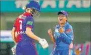  ?? PTI ?? Saika Ishaque (right) exults after dismissing DC captain Meg Lanning on Thursday. The MI spinner picked up 3/13.