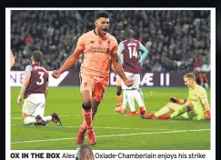  ??  ?? OX IN THE BOX Alex Oxlade-Chamberlai­n enjoys his strike