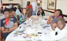  ??  ?? Women follow proceeding­s during the Women’s Developmen­t Dialogue breakfast meeting at a Bulawayo hotel yesterday