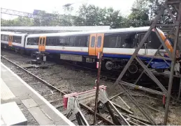  ?? RAIB ?? The scene at Enfield Town station on the morning of October 12, 2021, showing London Overground 710124 raised in the air following its collision with the buffer stops. The RAIB has now released its report into the collision following the conclusion of legal proceeding­s against the driver of the train.