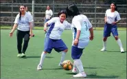  ?? REUTERS ?? Khalida Popal (left) coaches girls from Team Mexico for the Street Child World Cup, in Mexico City, on April 3.